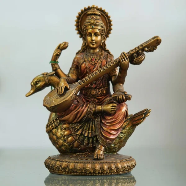 Decor Home Craft A Bronze Mata Saraswati ji idol to decorate the decor of a living room.